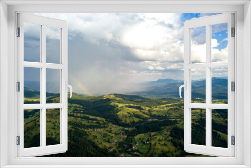 Fototapeta Naklejka Na Ścianę Okno 3D - Rainbow in the mountains of the Ukrainian Carpathians. Aerial drone view.