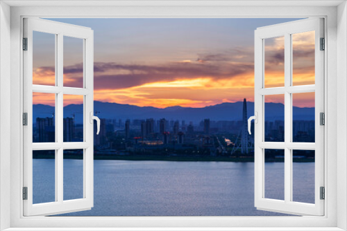 Fototapeta Naklejka Na Ścianę Okno 3D - sunset over the city in China