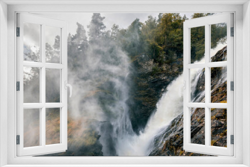 Fototapeta Naklejka Na Ścianę Okno 3D - panorama view of waterfall in norway on a rainy summer day