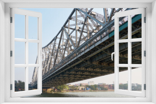 Fototapeta Naklejka Na Ścianę Okno 3D - Under the span of the Howrah Bridge 