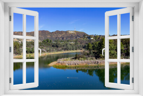 Fototapeta Naklejka Na Ścianę Okno 3D - Morning view of Hollywood reservoir with Hollywood sign