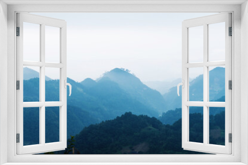 Fototapeta Naklejka Na Ścianę Okno 3D - Foggy morning in mountain range
