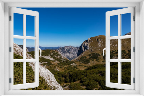 Fototapeta Naklejka Na Ścianę Okno 3D - Panoramic view on the mountain peaks of the Hochschwab Region in Upper Styria, Austria. Sharp summits of Ebenstein and Hinterer Polster, Alps in Europe. Climbing tourism, wilderness. Concept freedom.