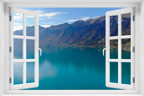 Fototapeta Naklejka Na Ścianę Okno 3D - The crystal clear blue water of Lake Brienz in the Swiss Alps - Switzerland from above