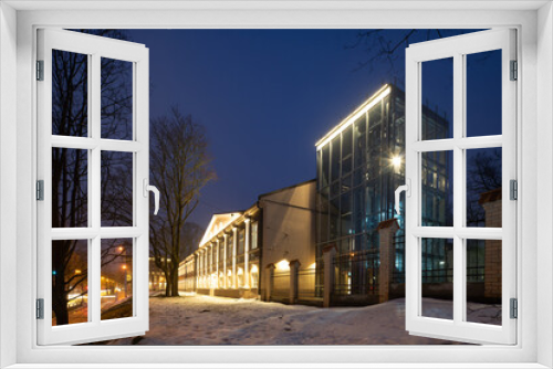 Fototapeta Naklejka Na Ścianę Okno 3D - Exterior of illuminated modern building. City architecture.