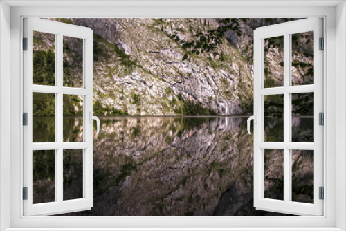 Fototapeta Naklejka Na Ścianę Okno 3D -  Rock wall reflected in lake