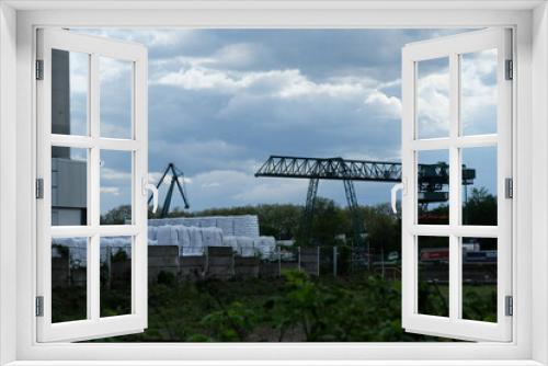 Fototapeta Naklejka Na Ścianę Okno 3D -  FU 2021-05-13 Rheinhafen 367 Neben Containern ist ein Industriekran