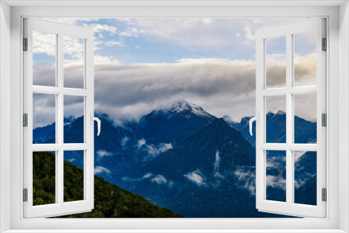 Fototapeta Naklejka Na Ścianę Okno 3D - Dramatic moody mountains