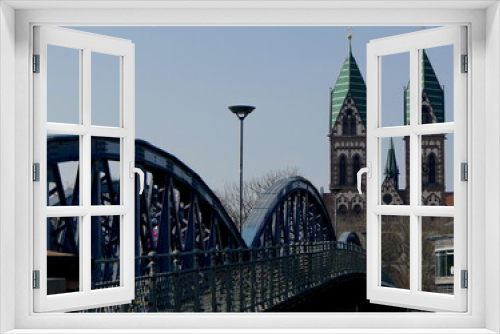 Fototapeta Naklejka Na Ścianę Okno 3D - Wiwili Brücke mit Herz-Jesu-Kirche in Freiburg