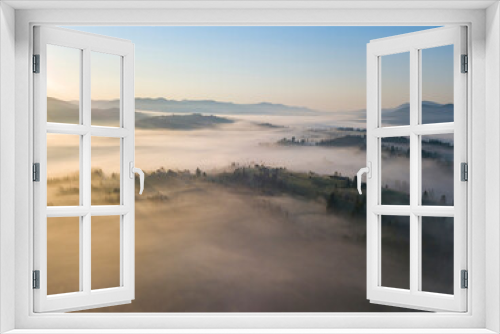 Fototapeta Naklejka Na Ścianę Okno 3D - Morning fog in the Ukrainian Carpathians. Aerial drone view.