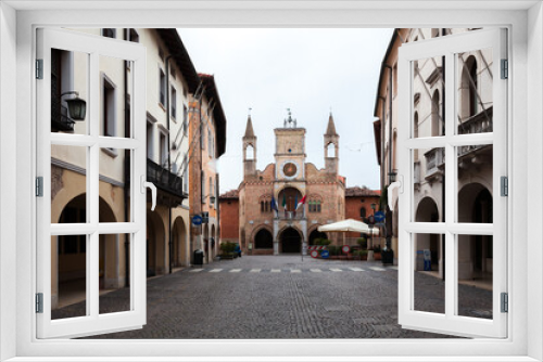 Fototapeta Naklejka Na Ścianę Okno 3D - Communal Palace of Pordenone on the end of the beautiful medieval Corso Vittorio Emanuelle II street