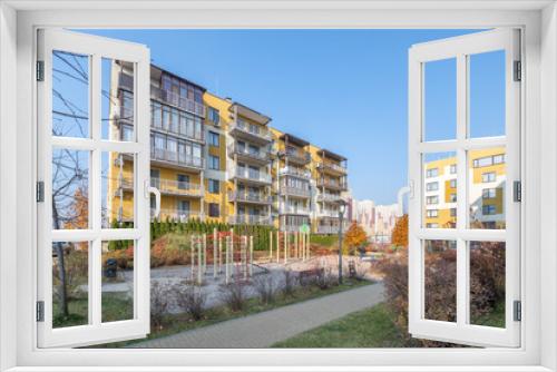 Fototapeta Naklejka Na Ścianę Okno 3D - Apartment building with children's and sports ground in Kiev Lipinka