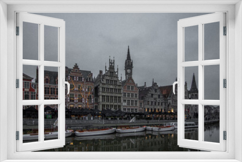 Fototapeta Naklejka Na Ścianę Okno 3D - Old buildings over a canal in Ghent