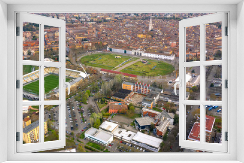 Fototapeta Naklejka Na Ścianę Okno 3D - Aerial view on the historic center of Modena and Alberto Braglia stadium. In the center stands the Ghirlandina tower, the symbol of the city.