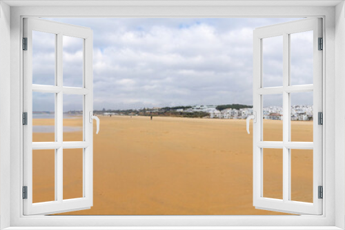 Fototapeta Naklejka Na Ścianę Okno 3D - Panoramic view of the beach and the sea with the white houses town of Conil, Cadiz, Spain