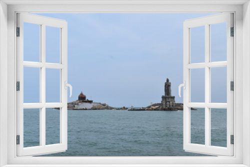 Fototapeta Naklejka Na Ścianę Okno 3D - The place in India where three rivers meet. Beautiful dramatic sky clouds monsoon climate at Kanyakumari beach Tamilnadu, South India.