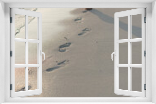 Fototapeta Naklejka Na Ścianę Okno 3D - footprints on the beach