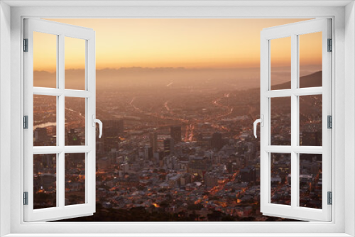 Fototapeta Naklejka Na Ścianę Okno 3D - Here comes the sun. Aerial view of a beautiful city at dawn.