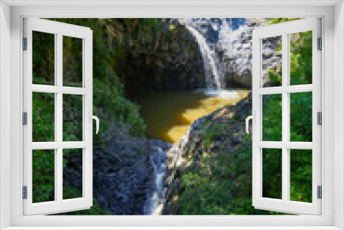 Fototapeta Naklejka Na Ścianę Okno 3D - Double waterfall and muddy pools on the Pipiwai Trail in the Haleakala National Park on the road to Hana, east of Maui island, Hawaii, United States