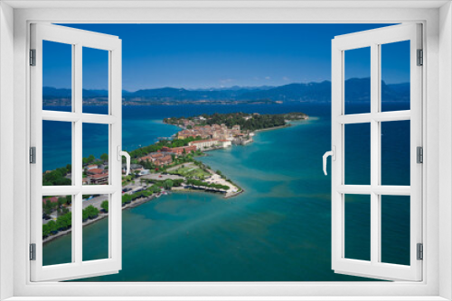 Fototapeta Naklejka Na Ścianę Okno 3D - Sirmione, Lake Garda, Italy. Aerial view of the Sirmione peninsula. In the background the mountains of Lake Garda