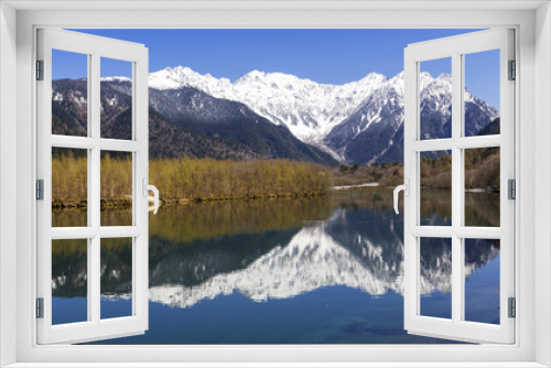 Fototapeta Naklejka Na Ścianę Okno 3D - Mountain Range reflected in lake