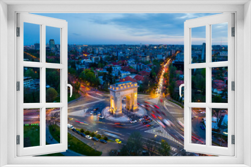 Fototapeta Naklejka Na Ścianę Okno 3D - Bucuresti Arcul de Triumf - Triumphal Arch in Bucharest at Night, Romania - long exposure.