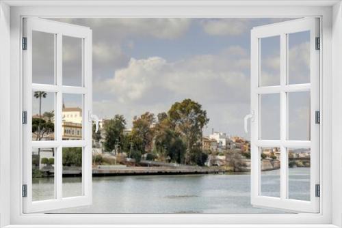 Fototapeta Naklejka Na Ścianę Okno 3D - Séville: palais de San Telmo et berges du Guadalquivir avec le quartier de Triana en Andalousie dans le sud de l'espagne