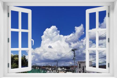 Fototapeta Naklejka Na Ścianę Okno 3D - clouds over the city
