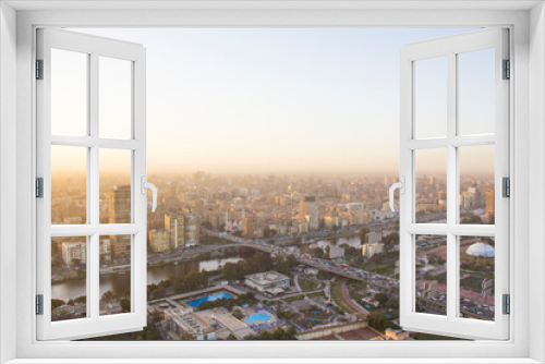Fototapeta Naklejka Na Ścianę Okno 3D - CAIRO, EGYPT - DECEMBER 29, 2021: Beautiful view of the center of Cairo and Zamalek island from the Cairo Tower in Cairo, Egypt