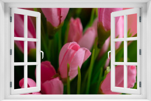 Fototapeta Naklejka Na Ścianę Okno 3D - Artificial pink flowers on a pink background.