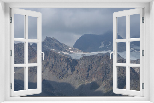 Fototapeta Naklejka Na Ścianę Okno 3D - The peaks and glaciers of the Bernina group: one of the mountains of the Alps that exceeds 4000 meters, near the village of Chiesa in Valmalenco, Lombardy, Italy - September 2021.
