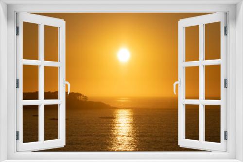 Fototapeta Naklejka Na Ścianę Okno 3D - Atardecer en la costa 