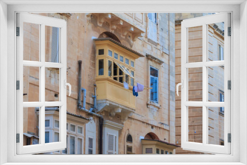 Fototapeta Naklejka Na Ścianę Okno 3D - Historical old colorful balconies in Valletta, Malta