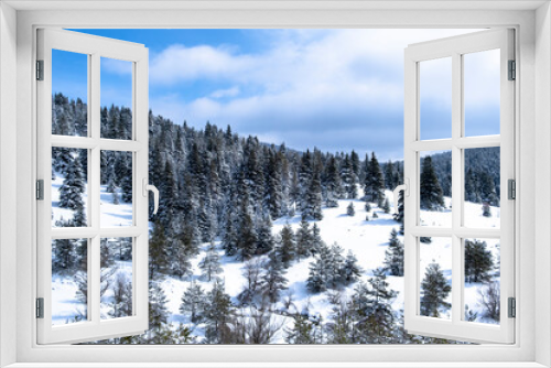 Fototapeta Naklejka Na Ścianę Okno 3D - Bolu Yeniçaga location, on the Istanbul - Ankara road. a winter landscape with snow-covered forests and blue sky