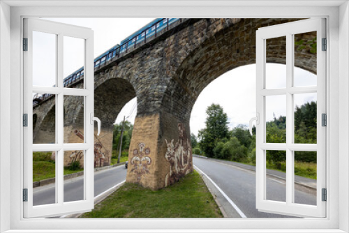 Fototapeta Naklejka Na Ścianę Okno 3D - Old railway arch bridge. Panorama.