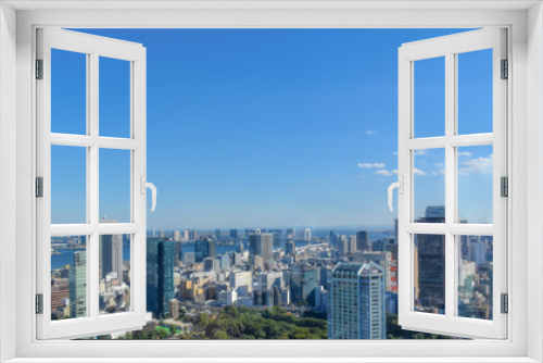 Fototapeta Naklejka Na Ścianę Okno 3D - 青空と建物の都市風景素材　ビジネスイメージ　日本　東京都六本木　眺望　超高層ビル群