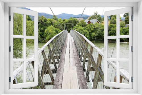 Fototapeta Naklejka Na Ścianę Okno 3D - Walking on Pokororo swingbridge - New Zealand