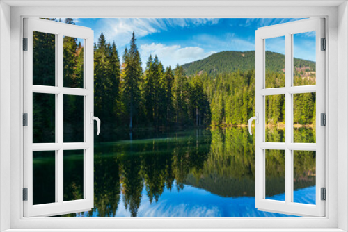 Fototapeta Naklejka Na Ścianę Okno 3D - landscape with mountain lake in summer. forest reflection in the water. scenic travel background of synevyr, ukraine. beautiful nature scenery. green outdoor environment
