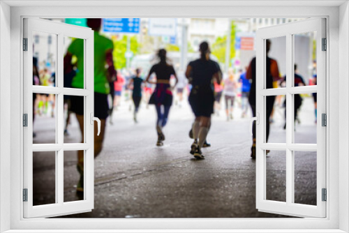 marathon runners in the city