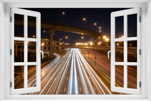 Fototapeta Naklejka Na Ścianę Okno 3D - Long exposure light trails on a modern speedway