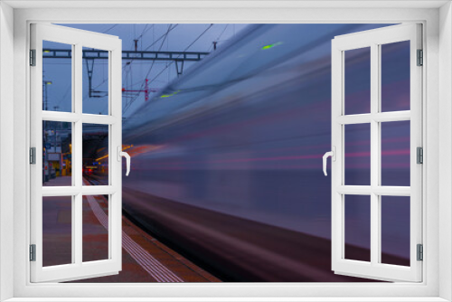 Fototapeta Naklejka Na Ścianę Okno 3D - Rails and trains in Zurich main station 2022 04 03 after sunset