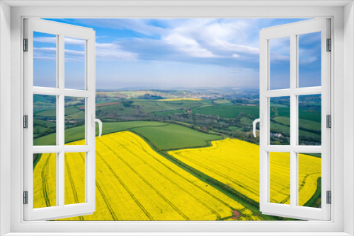 Fototapeta Naklejka Na Ścianę Okno 3D - Panorama over Farmlands and Rapeseed fields from a drone, Devon, England