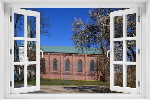 Fototapeta Naklejka Na Ścianę Okno 3D - Historische Kirche im Frühling in der Stadt Rothenburg am Fluss Wümme, Niedersachsen