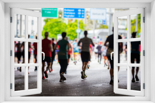 marathon runners in the city