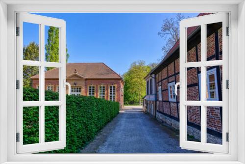 Fototapeta Naklejka Na Ścianę Okno 3D - Historische Gebäude an einem Schlosspark in Rheda-Wiedenbrück