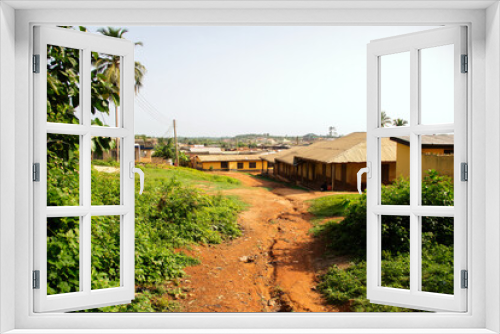 Fototapeta Naklejka Na Ścianę Okno 3D - Walkway into a village township in Africa Ghana