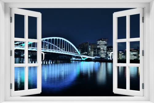 Fototapeta Naklejka Na Ścianę Okno 3D - 隅田川から見るライトアップされた東京タワーと築地大橋