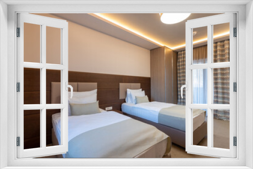 Interior of a luxury hotel double bed bedroom