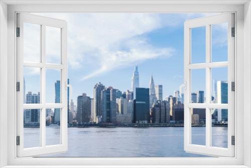 Fototapeta Naklejka Na Ścianę Okno 3D - View from from Roosevelt Island to Midtown East buildings. Skyline of East side of Manhattan