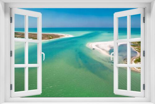 Fototapeta Naklejka Na Ścianę Okno 3D - Island. Florida beach. Panorama of Caladesi island and Honeymoon Island State Park. Summer vacation in USA. Blue-turquoise color of salt water. Ocean or Gulf of Mexico. Tropical Nature. Aerial view. 